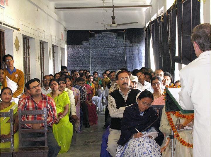 07 HDMVM Parents.jpg - Parents and faculty listen with great interest to Dr Deans as he presents the latest news of Maharishi Vedic Science and invites students to attend Maharishi University of Management in Iowa, USA.